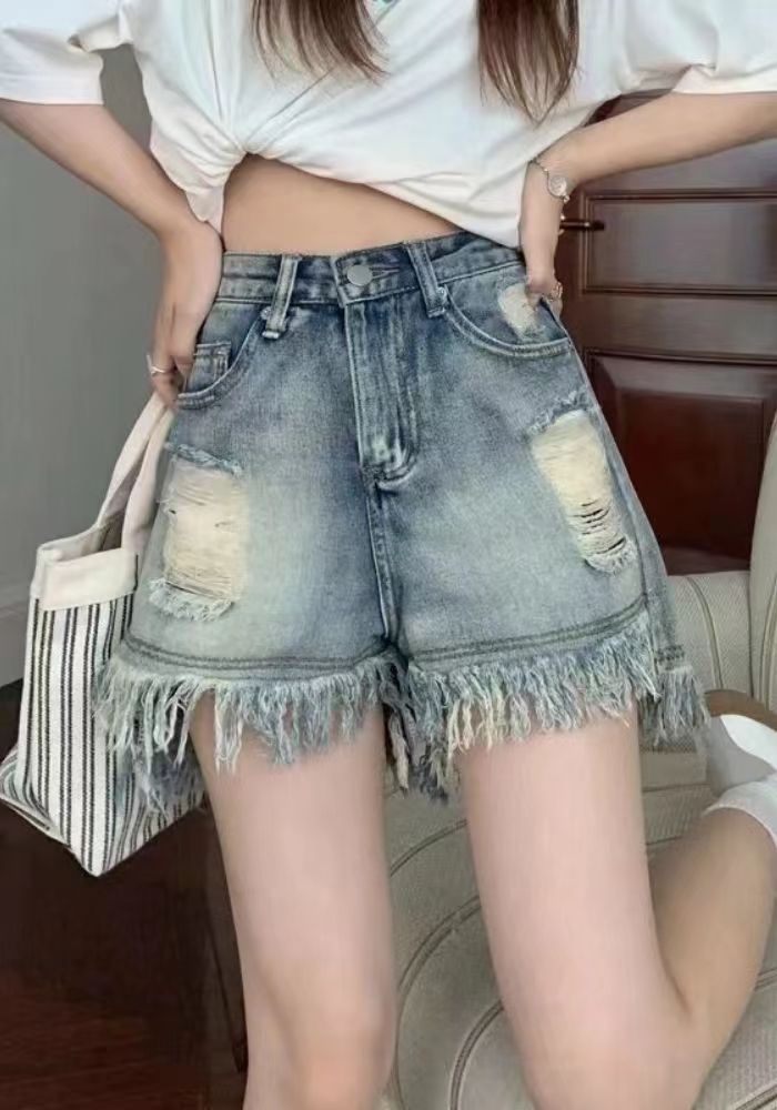破洞流蘇闊腿短褲