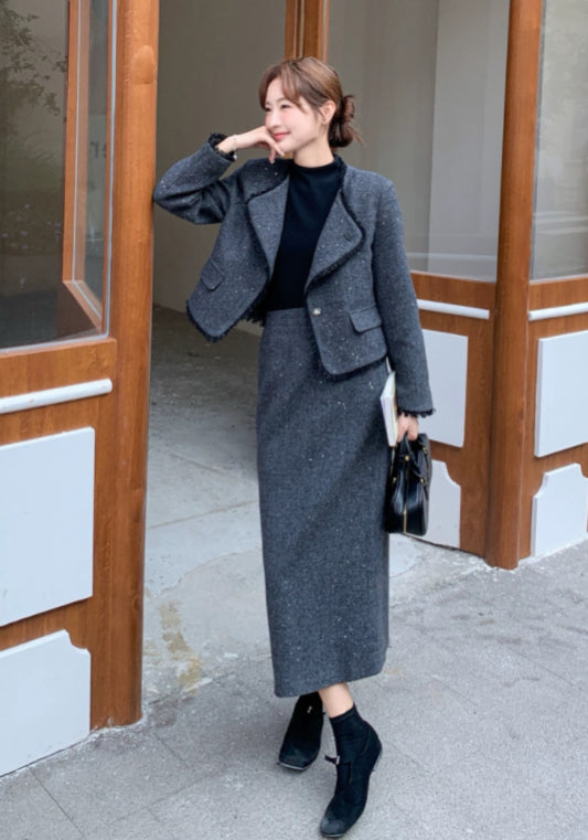 Dark gray Chanel-style suit