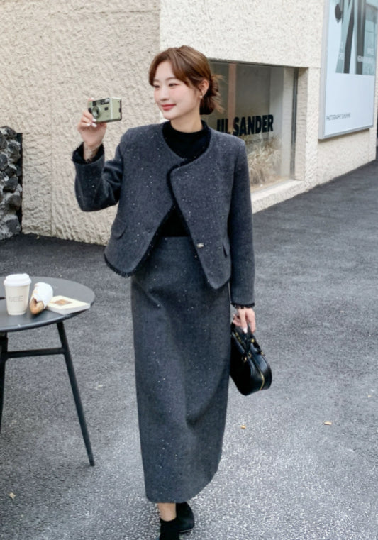 Dark gray Chanel-style suit