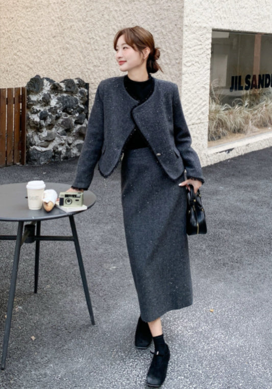 Dark gray Chanel-style suit