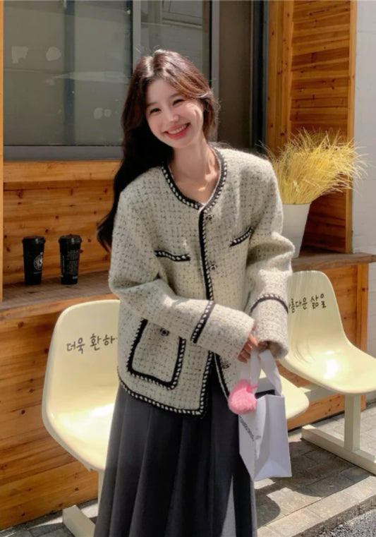 Black and white color-blocked Chanel-style jacket