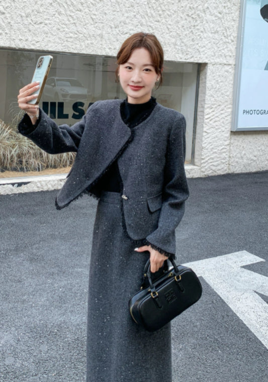 Dark gray Chanel-style suit