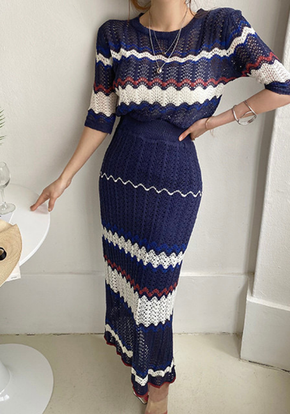 Knitted hollow contrasting top + hip-covering skirt set