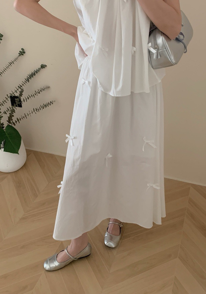 Bow sleeveless vest + skirt suit