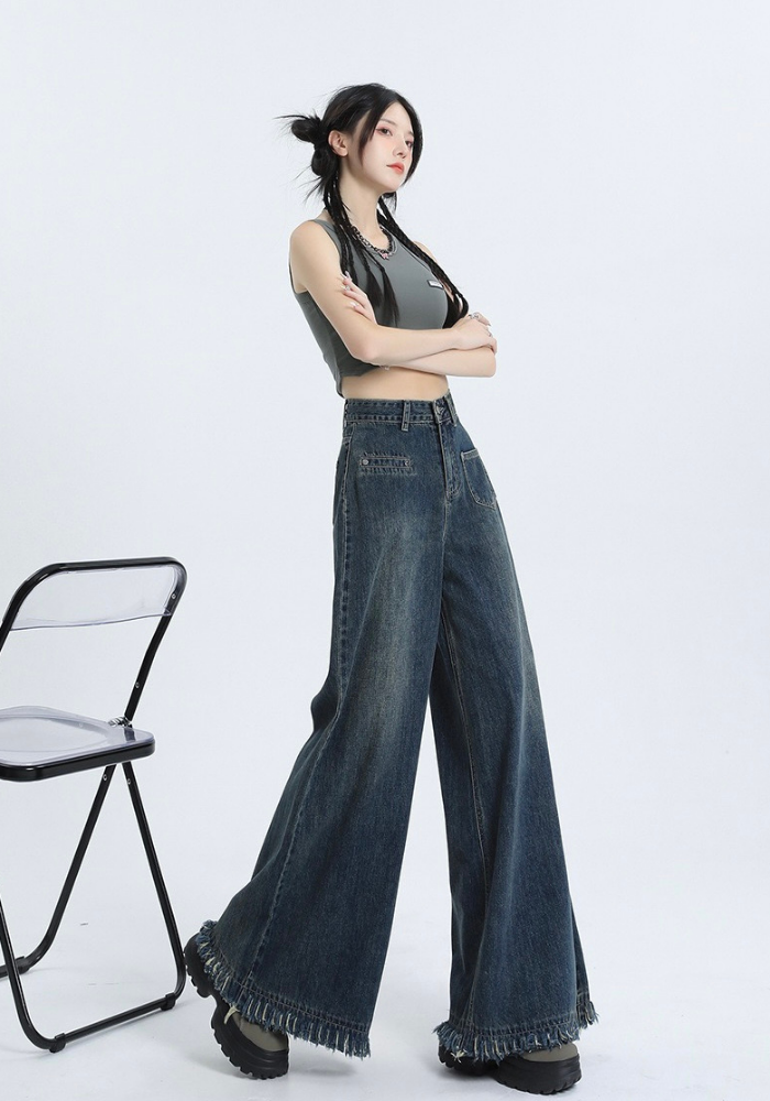 Fringed raw edge floor-length jeans