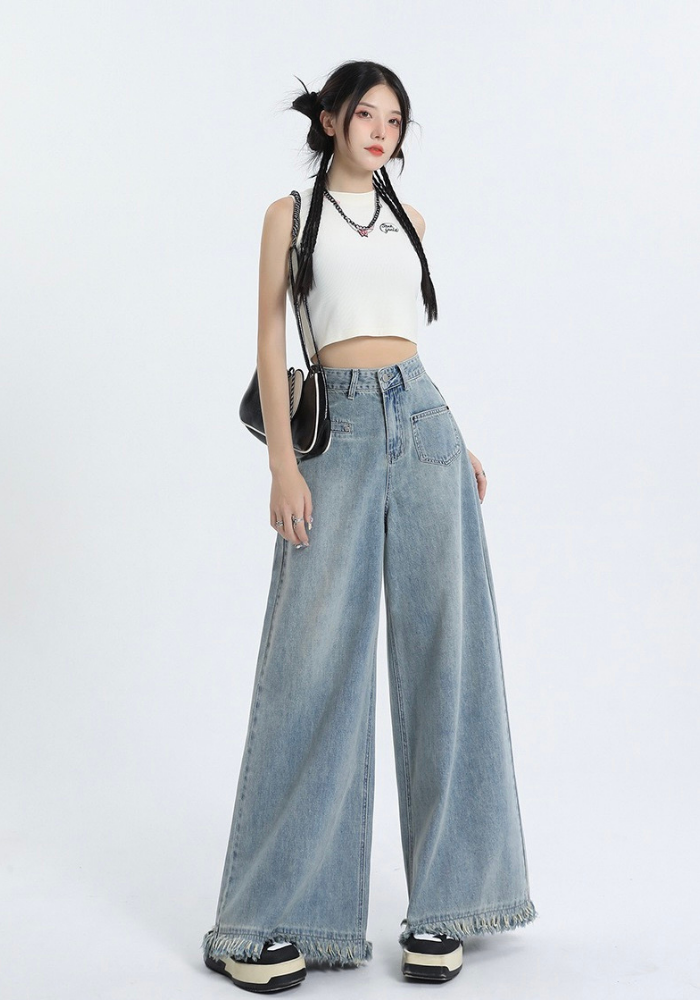 Fringed raw edge floor-length jeans