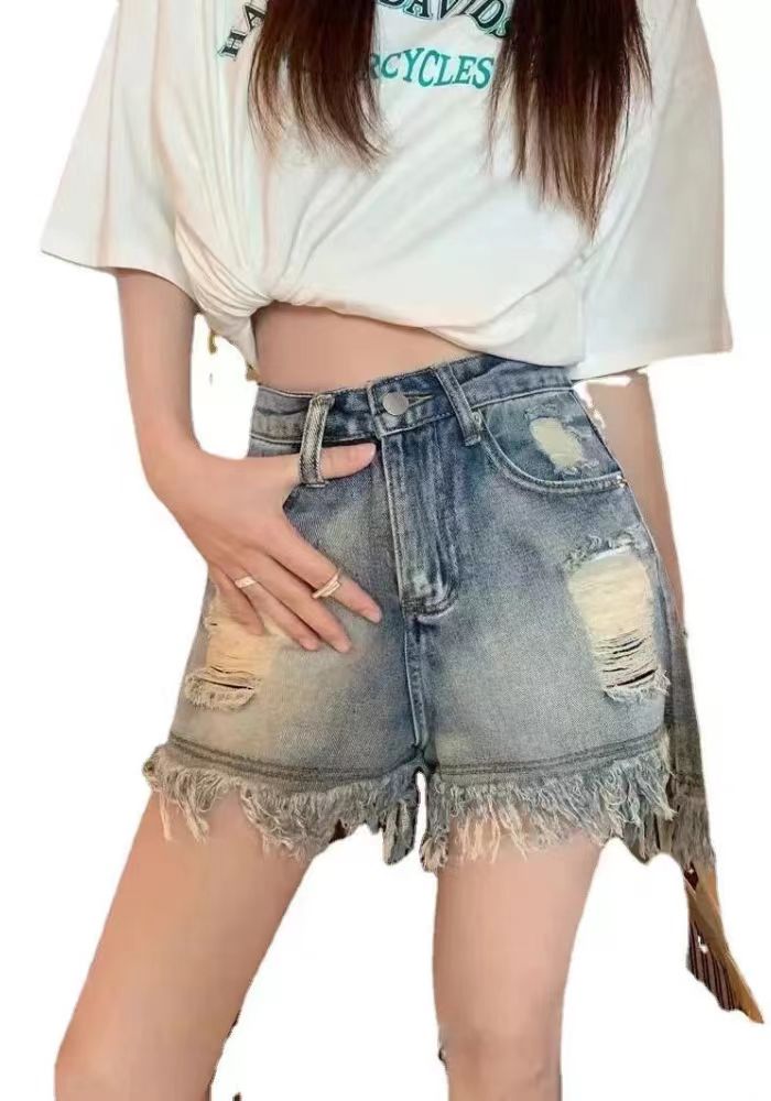 Distressed fringed wide-leg shorts